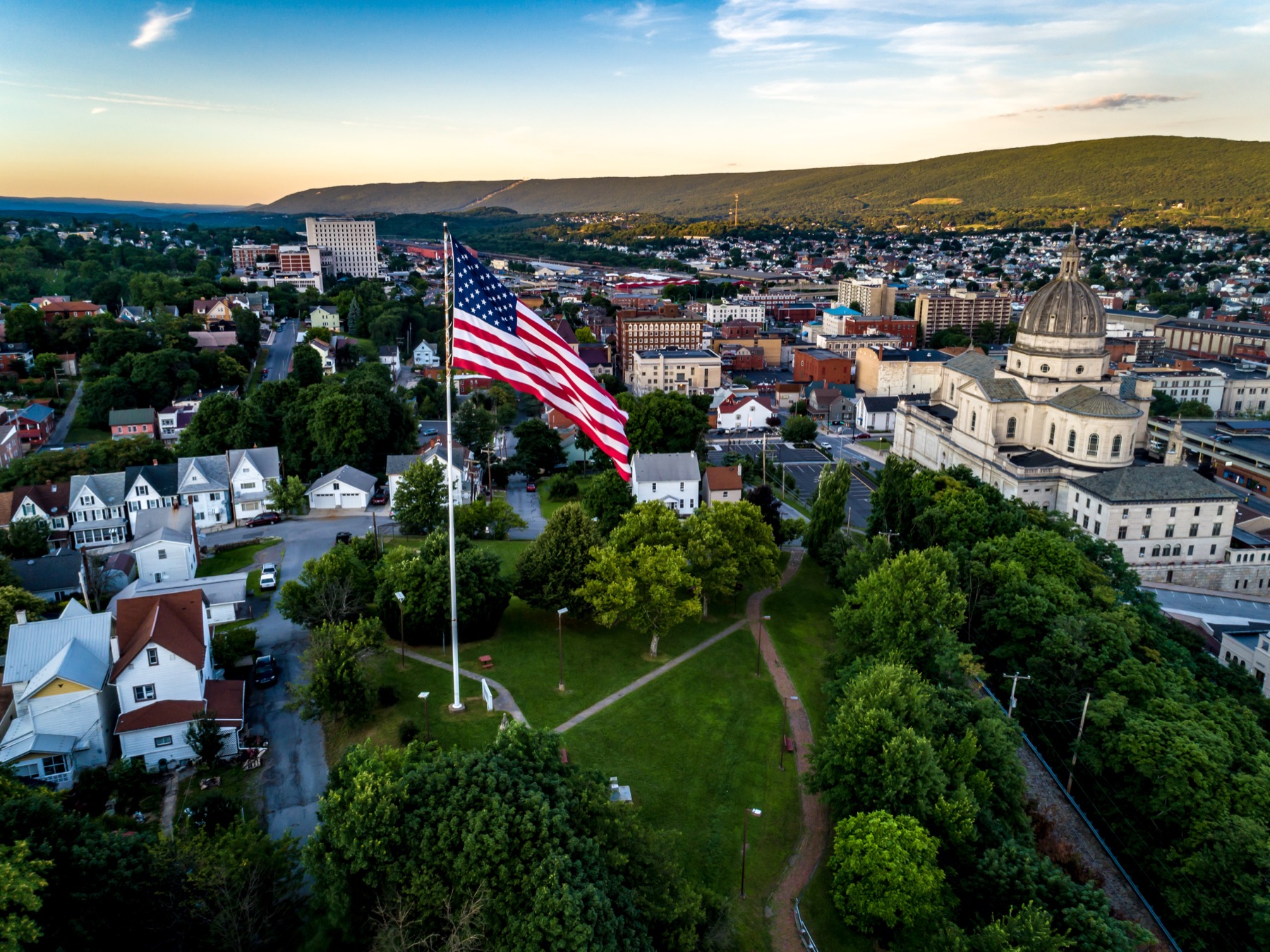 Aerial view of Altoona, Pennsylvania with the American flag and downtown skyline